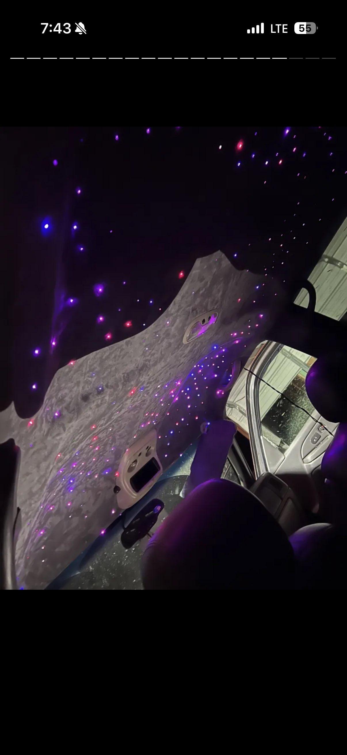 White suede headliner with color stars