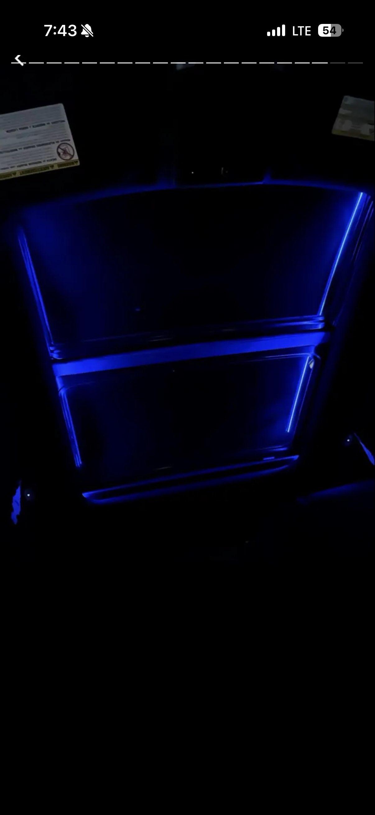 Under-dash blue underglow interior shot